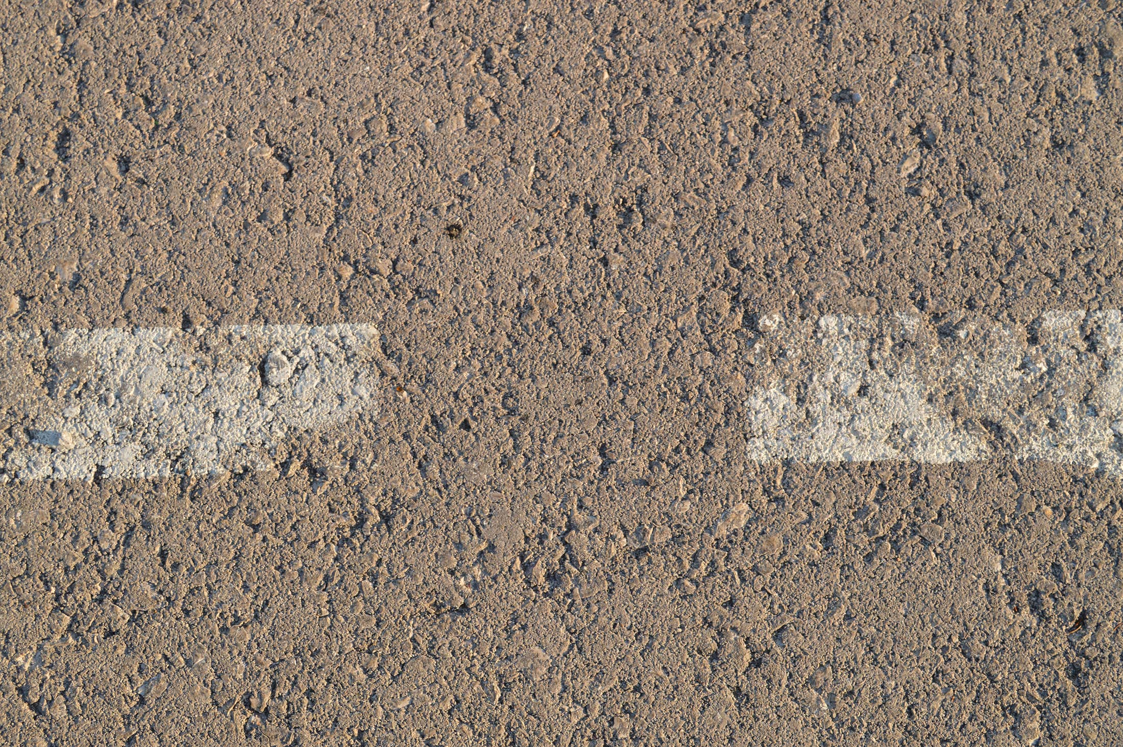 Asphalt with two white lines for 2200 x 1463 resolution